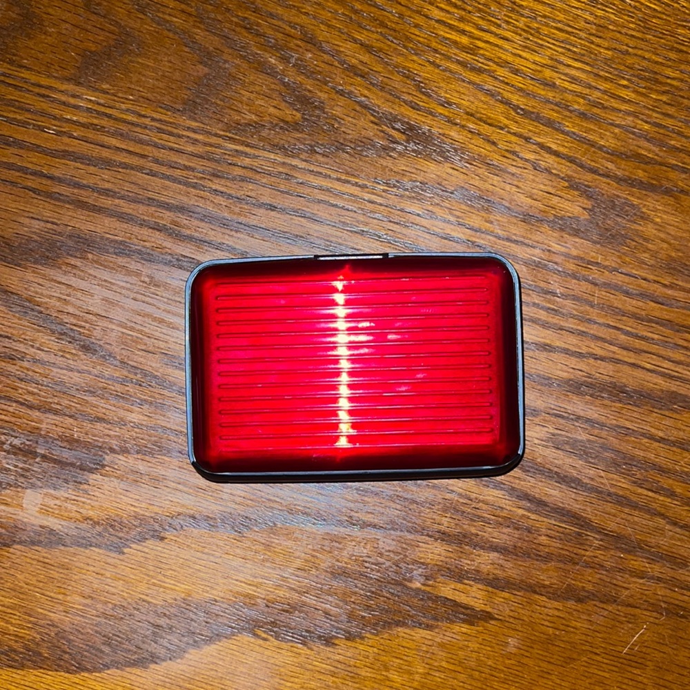Red plastic hard case wallet